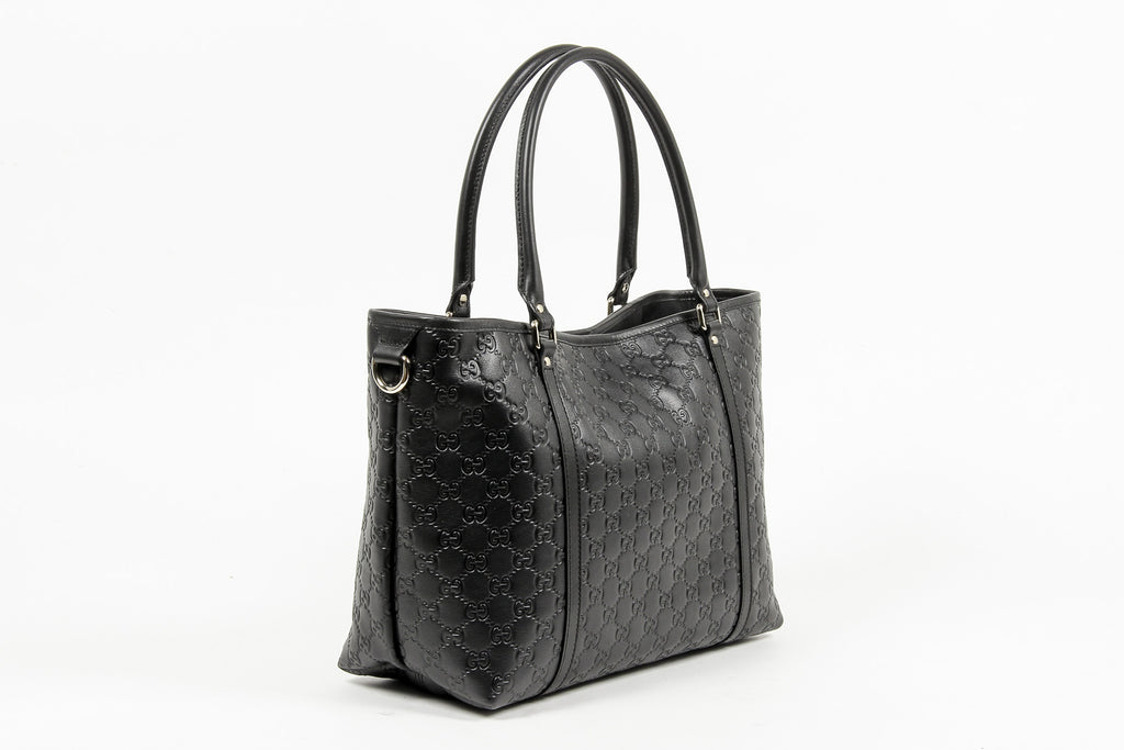 Borsa a mano Gucci da donna in pelle Guccissima nera con logo GG