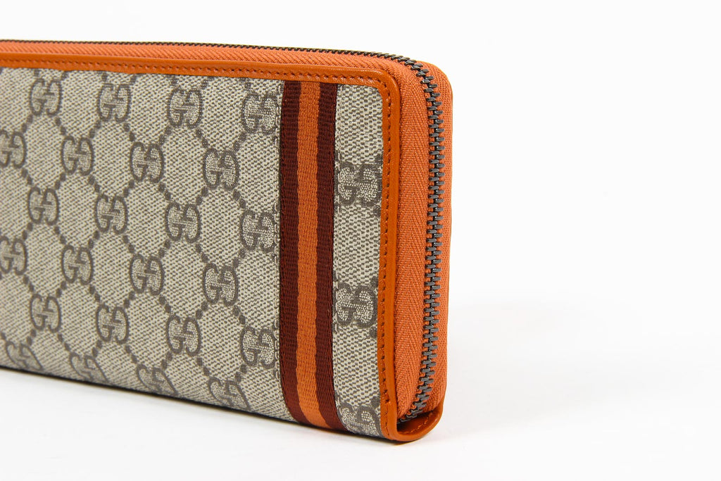 Portafoglio Gucci da uomo in tela GG Supreme Guccissima Web con cerniera