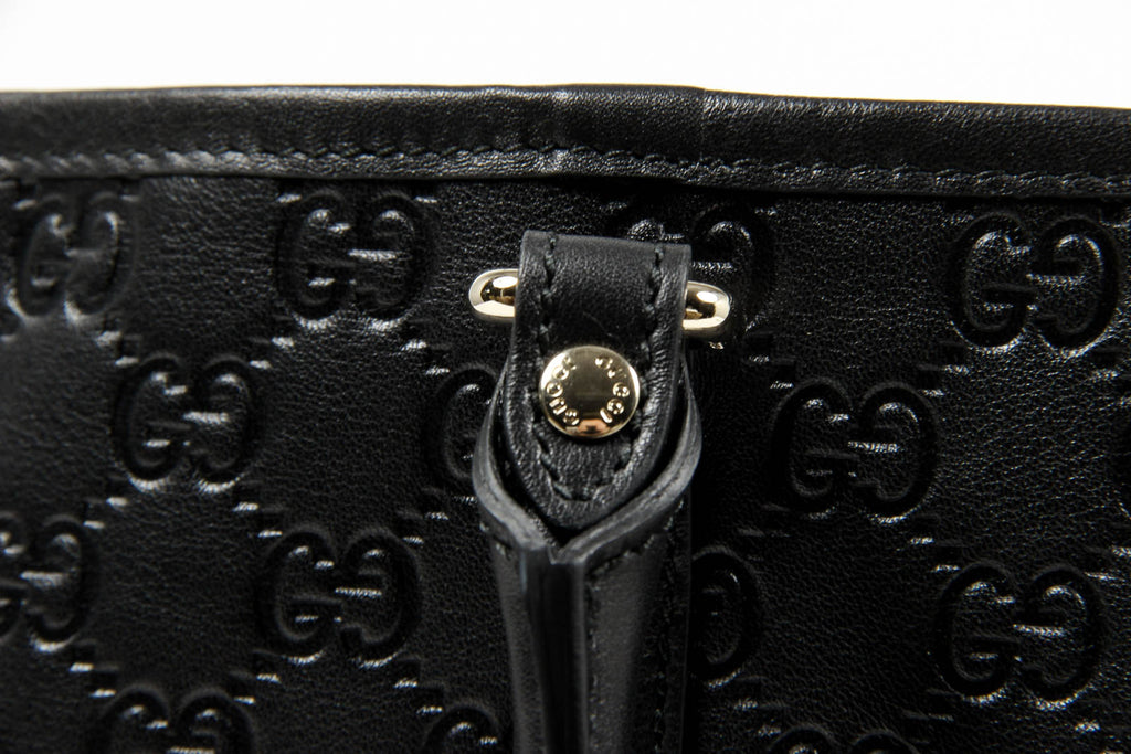 Borsa a mano Gucci da donna in pelle Guccissima nera con logo GG