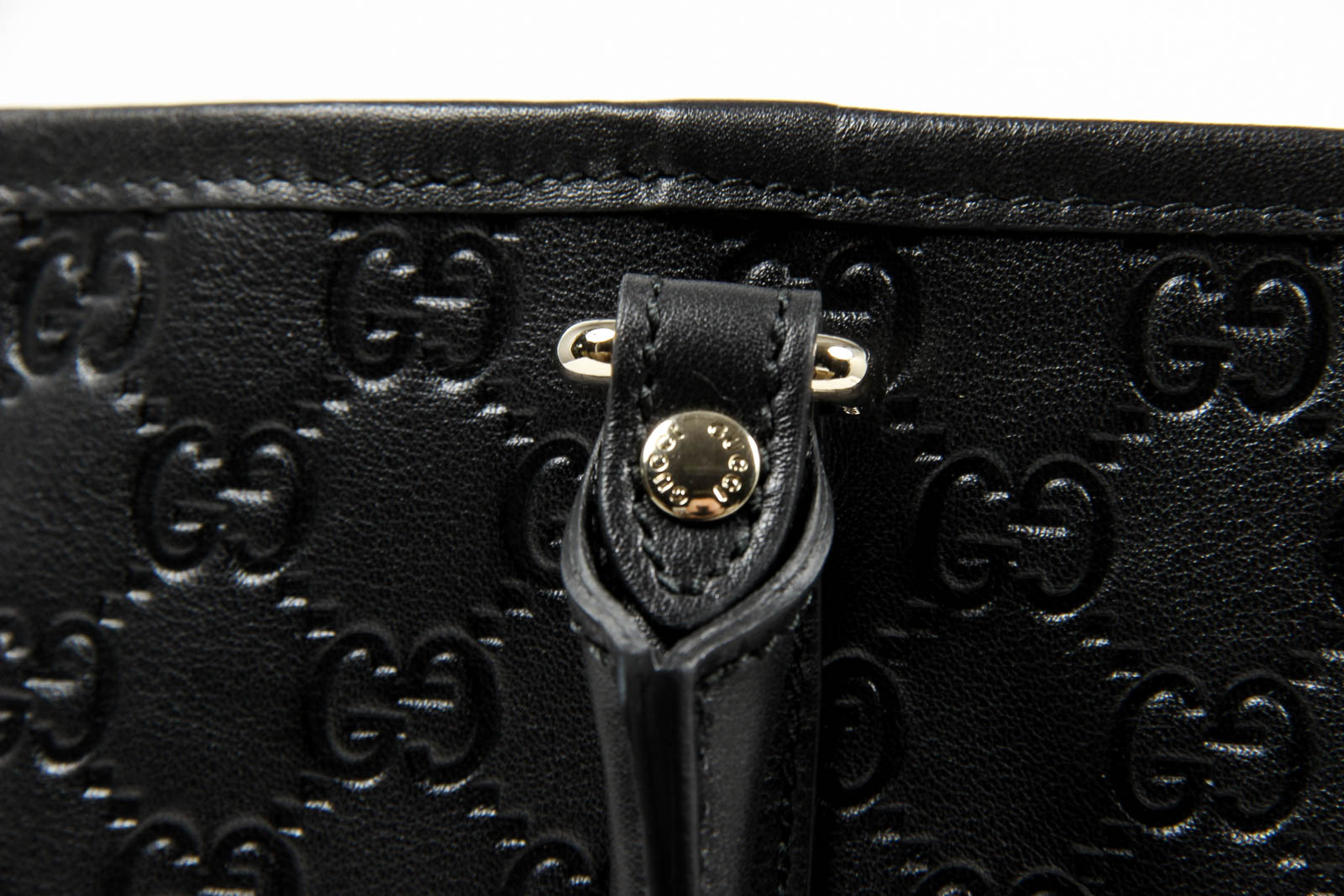 Borsa a mano Gucci da donna in pelle Guccissima nera con logo GG