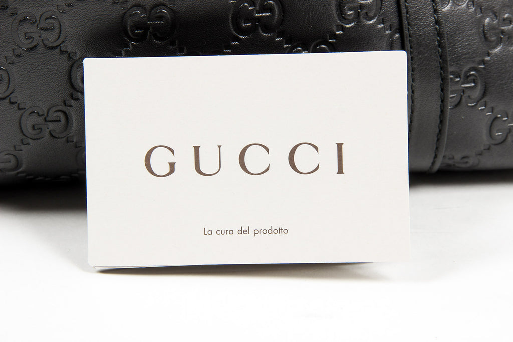 Borsa a mano Gucci da donna in pelle Guccissima nera con logo GG