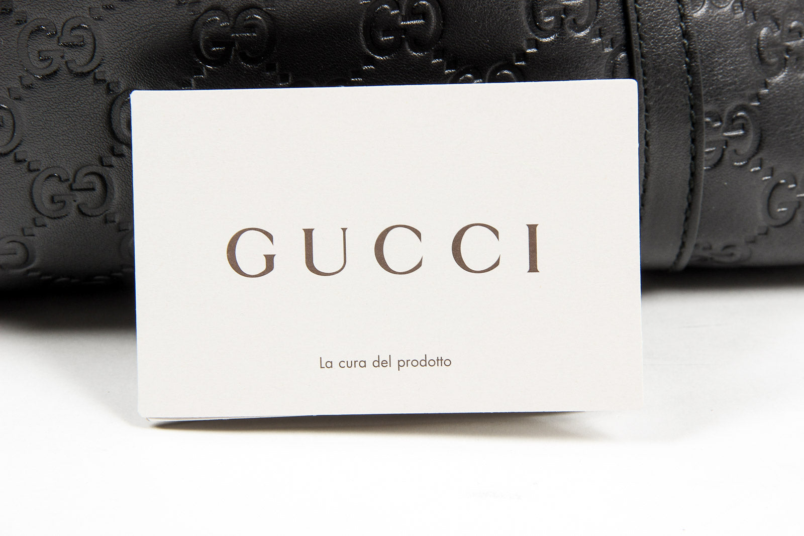 Borsa a mano Gucci da donna in pelle Guccissima nera con logo GG