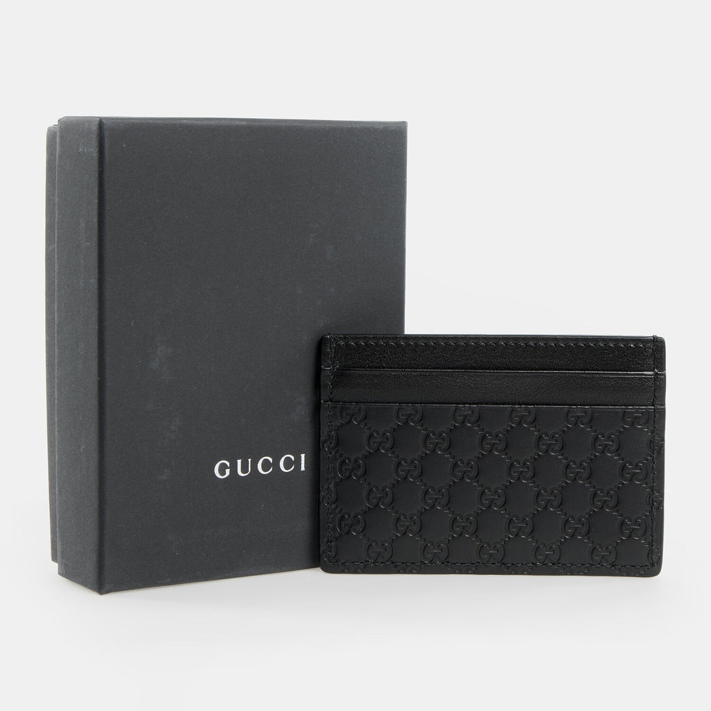 Porta carte di credito Gucci Guccissima in pelle nera