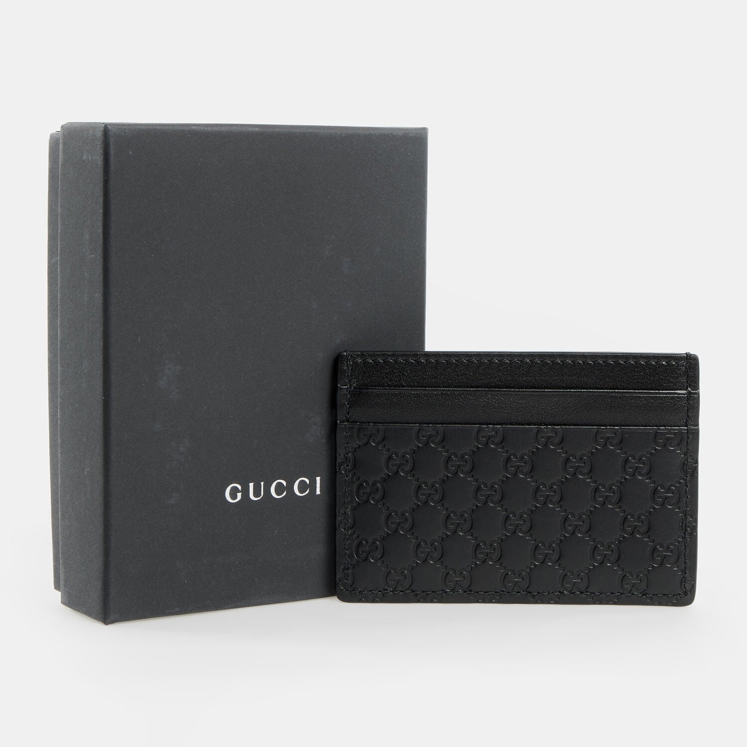 Porta carte di credito Gucci Guccissima in pelle nera