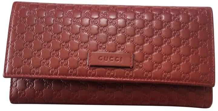 Portafoglio Gucci Guccissima in pelle rosso