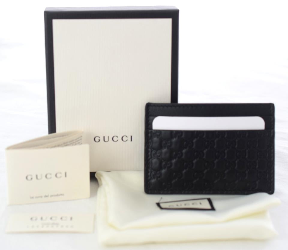Porta carte di credito Gucci Guccissima in pelle nera