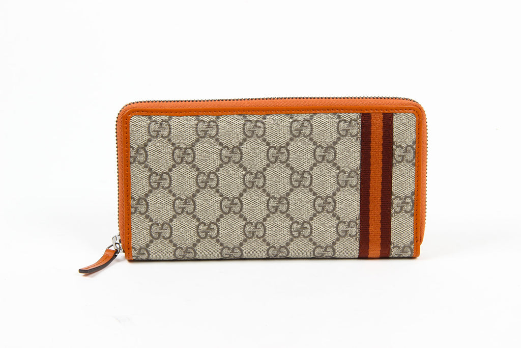 Portafoglio Gucci da uomo in tela GG Supreme Guccissima Web con cerniera